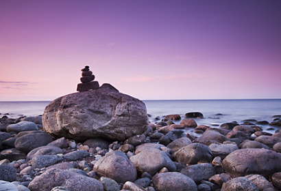 Fototapeta Sunset on the stone beach 24081